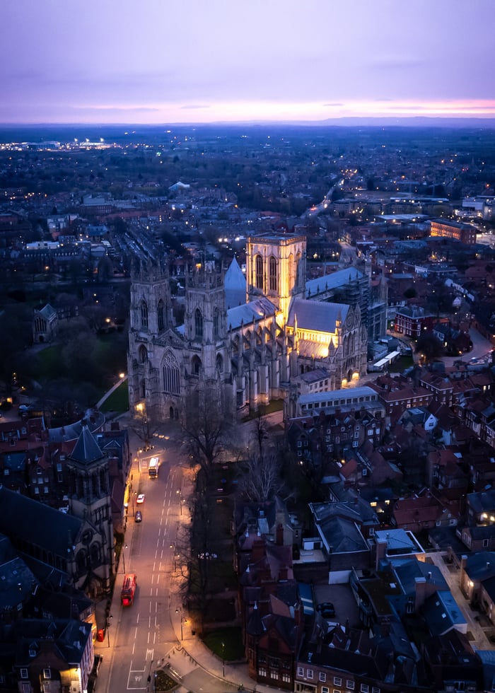 private-party-05 Stunning aerial view of York Minster illuminated at twilight, showcasing the architectural beauty and surrounding cityscape.